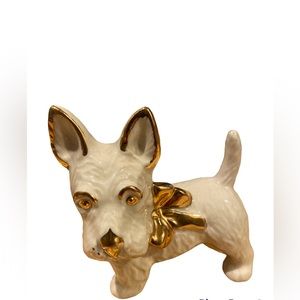 Vintage porcelain  Scottie Terrier dog figurine with gold detail. Cream in color